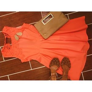 Ya Los Angeles fit and flare coral dress.